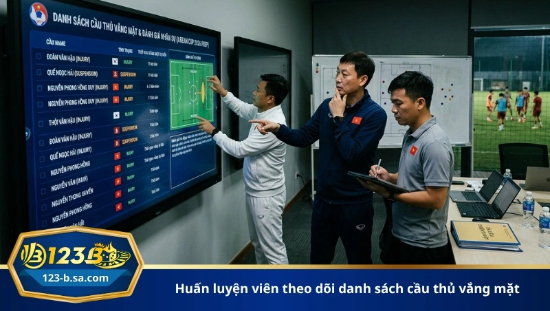 huấn luyện viên theo dõi danh sách cầu thủ vắng mặt